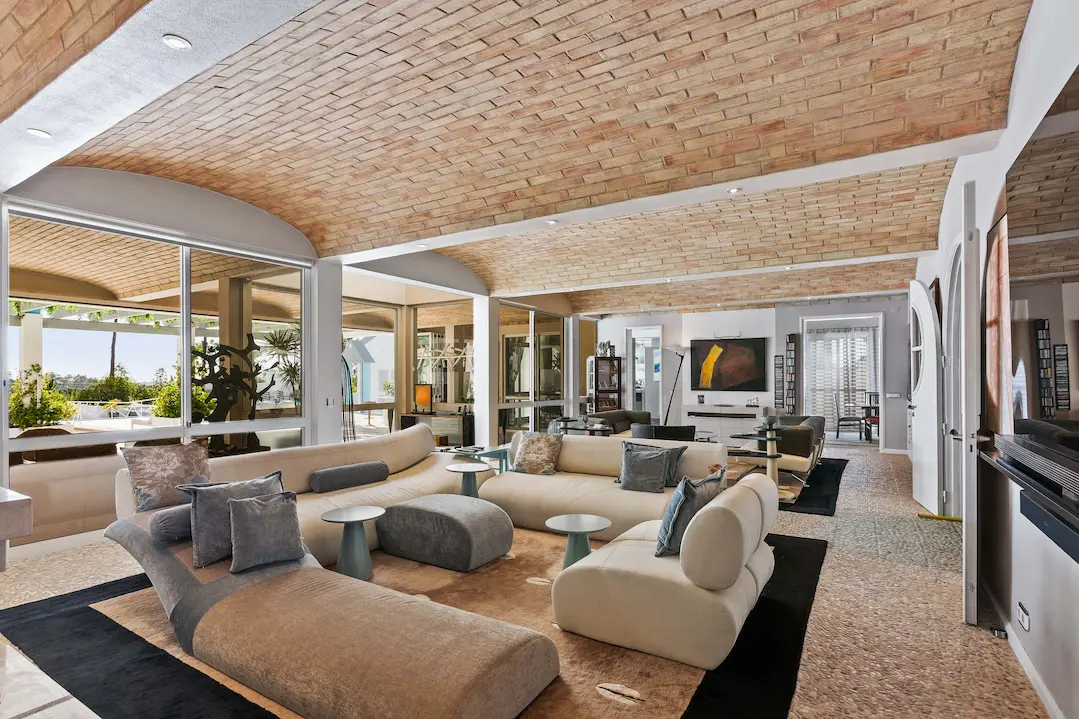 Elegant lounge with pool views inside Casa Estrela luxury villa Algarve