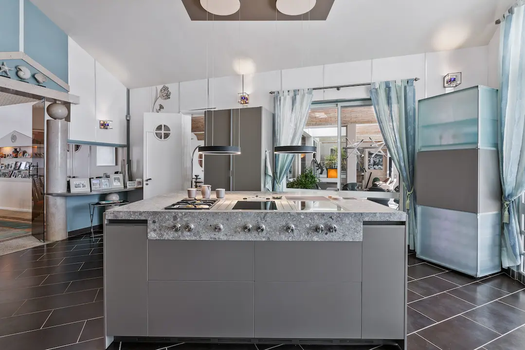 Modern kitchen with stone island in Casa Estrela luxury villa Algarve