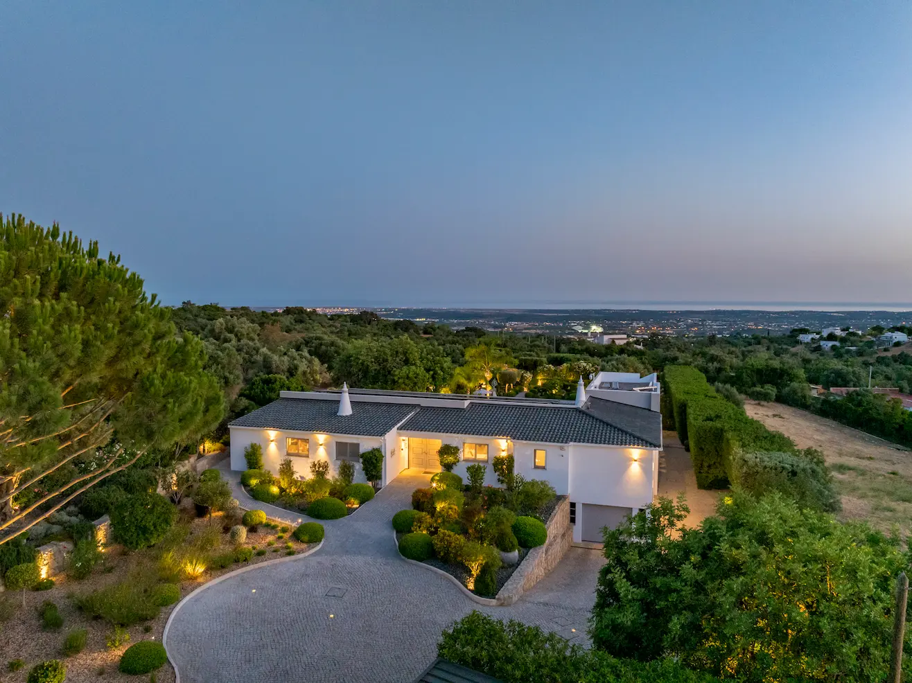 Aerial view of Casa Harmonia luxury villa overlooking Algarve coastline and countryside