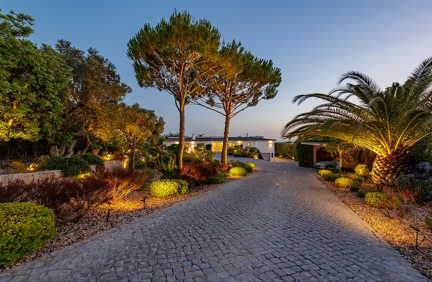 Private driveway entrance to Casa Harmonia luxury villa surrounded by landscaped gardens
