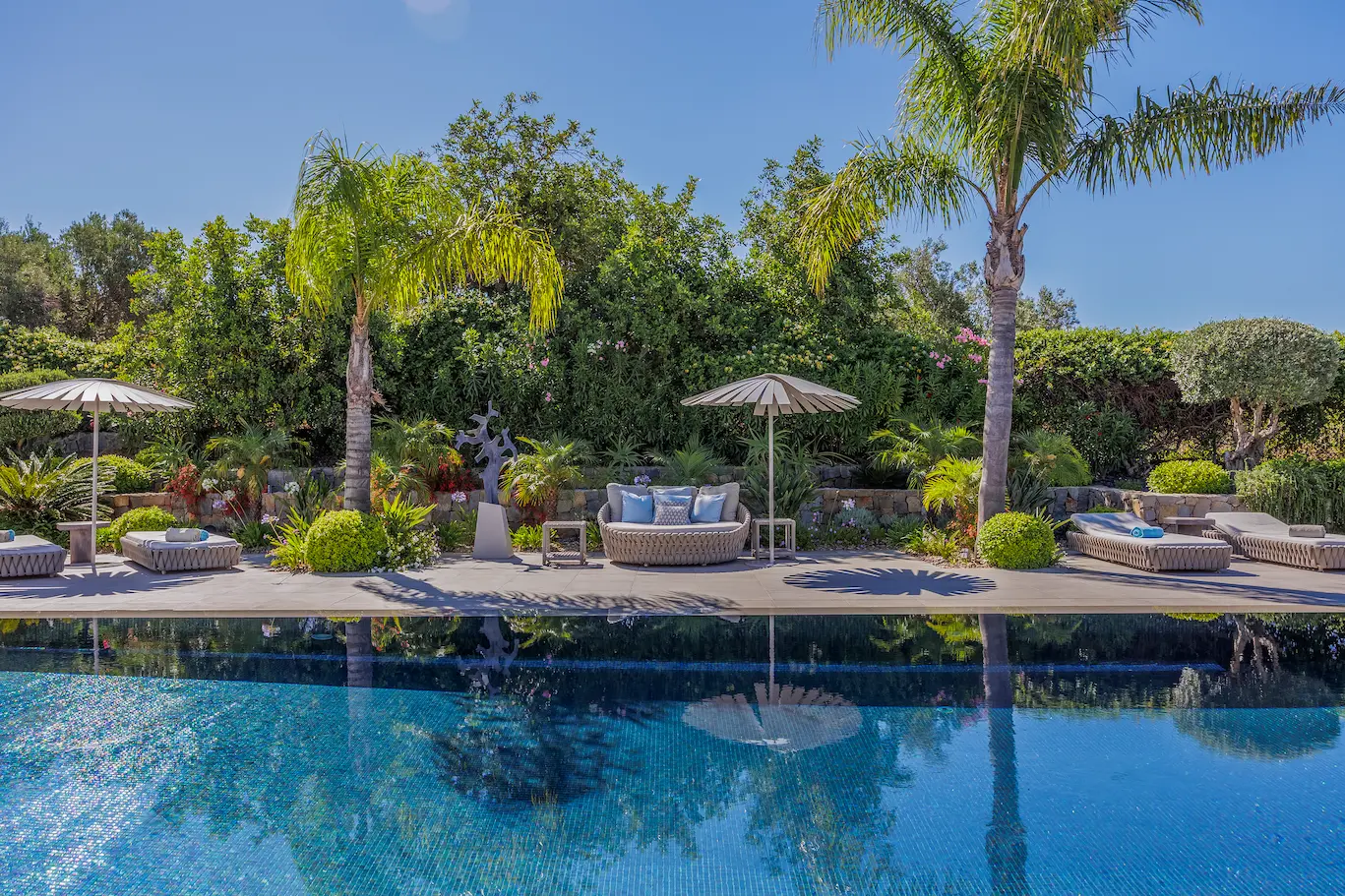 Panoramic terrace and pool area of Casa Harmonia luxury villa overlooking the Algarve coastline