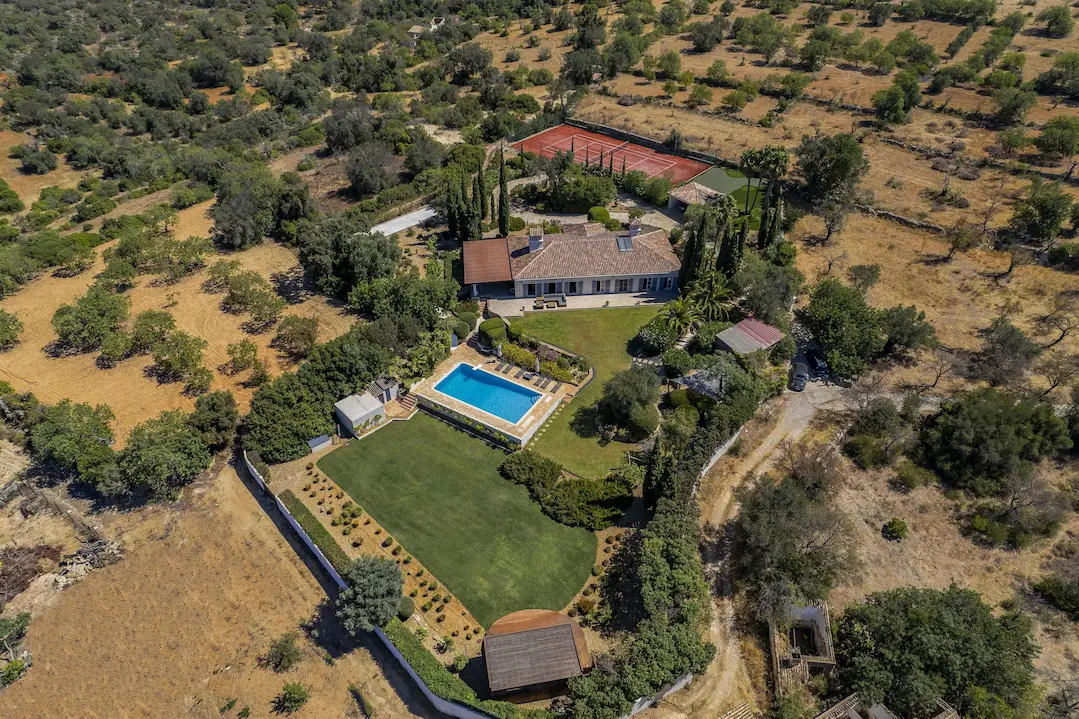 Aerial view of Villa Alegria luxury property with gardens and panoramic Algarve views