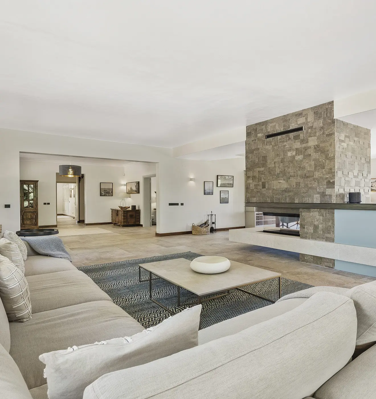 Elegant lounge area with fireplace inside Villa Alegria luxury villa Algarve