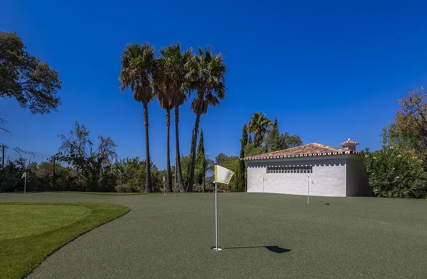 Private mini golf course in landscaped garden of Villa Alegria Algarve